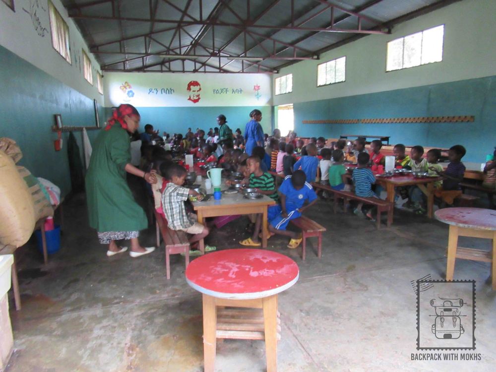 Free meal programme dining hall with children